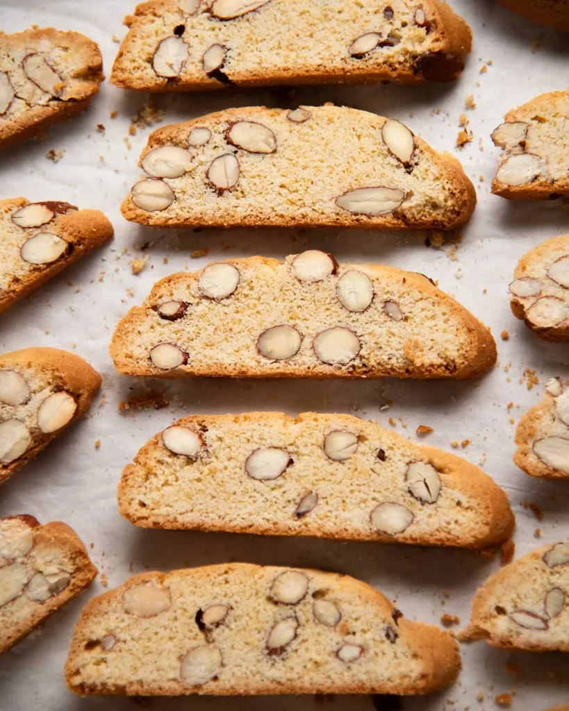 Crisp Christmas biscotti served with a warm holiday drink