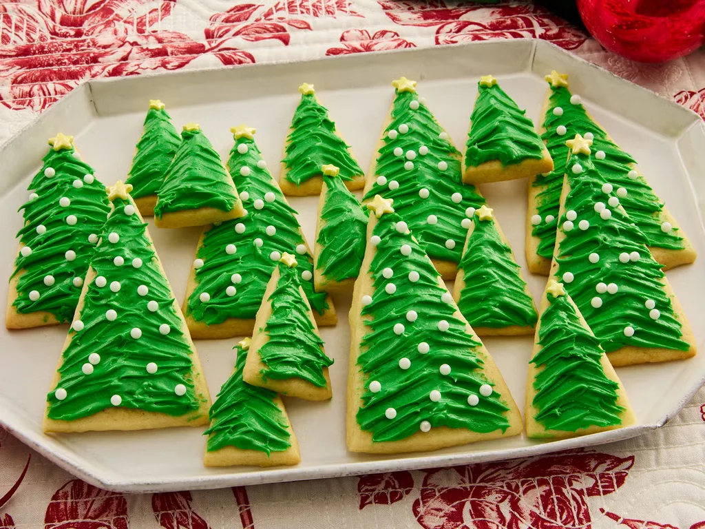 Christmas tree sugar cookies decorated with colorful festive icing