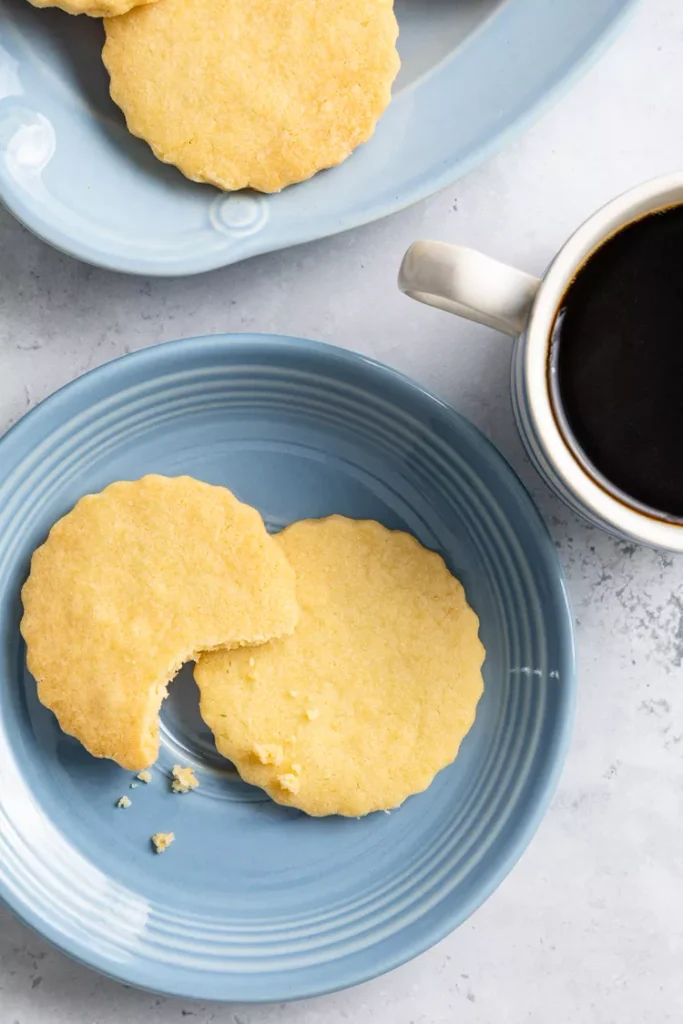 Buttery shortbread cookies arranged on a festive Christmas plate