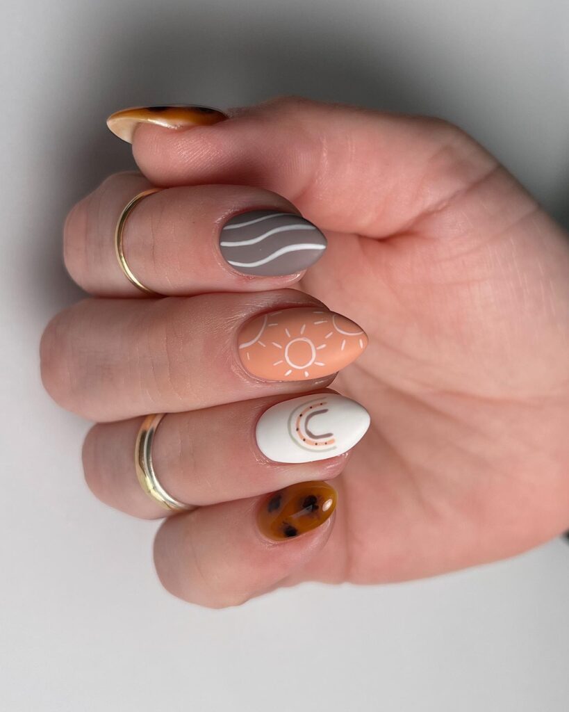 A stylish collection of almond nails featuring seasonal almond nails and creative nail art Ideas.