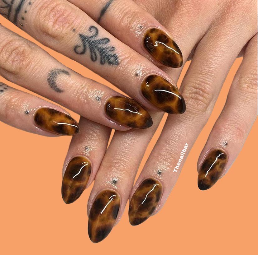 A stylish collection of almond nails featuring seasonal almond nails and creative nail art Ideas.