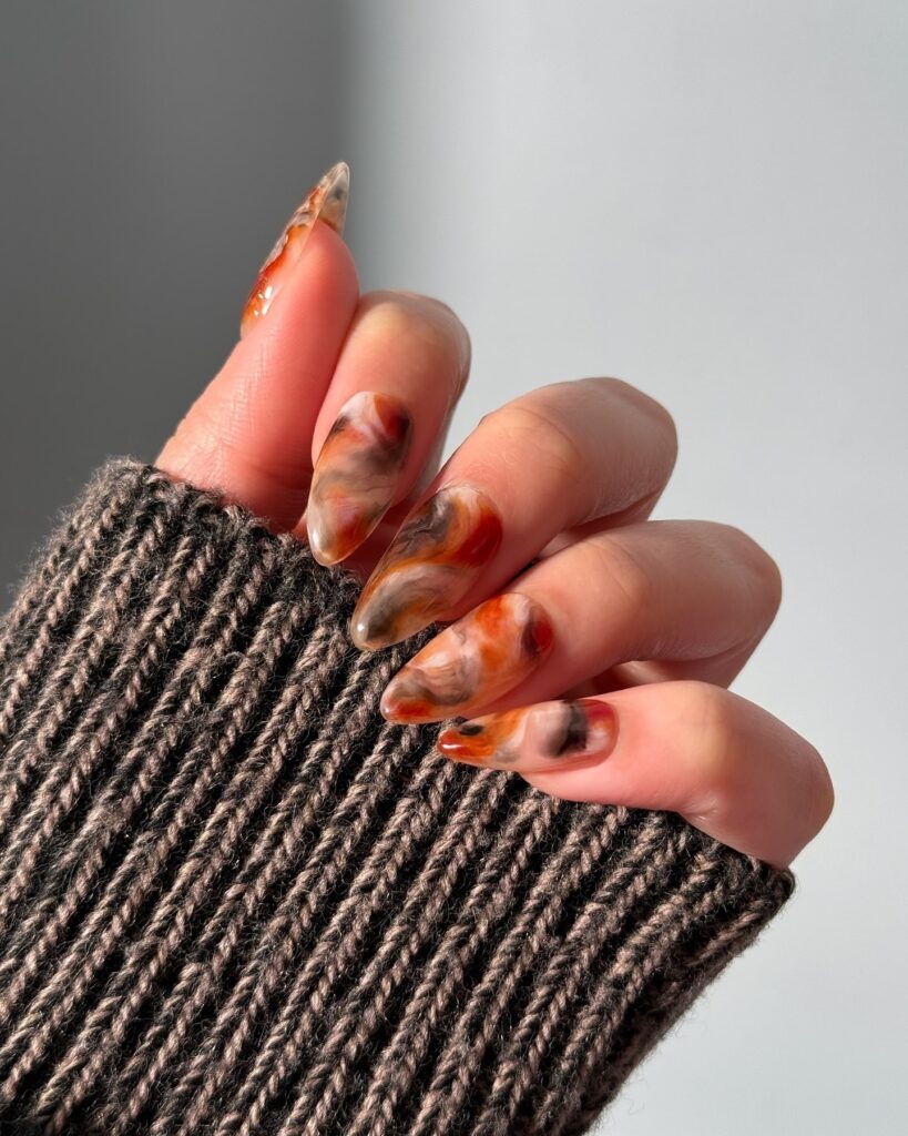 A stylish collection of almond nails featuring seasonal almond nails and creative nail art Ideas.