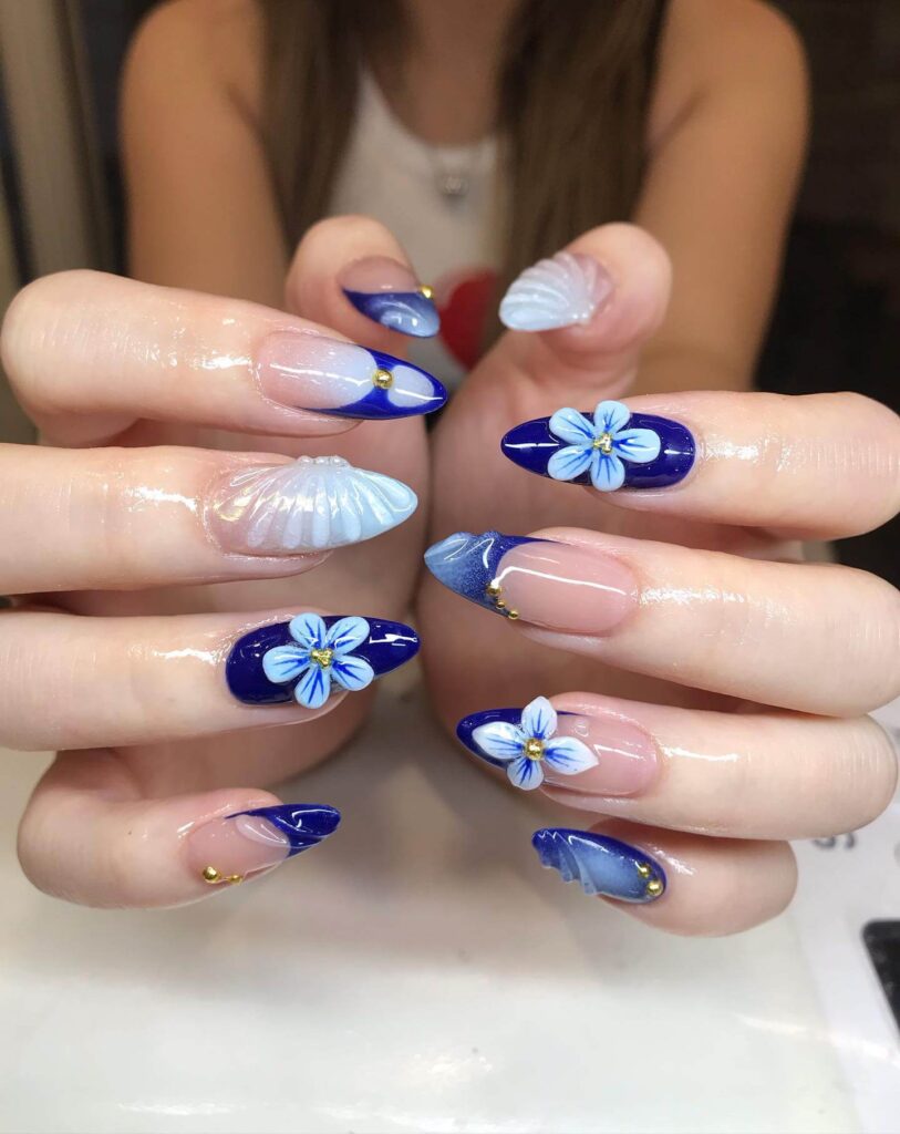 A collection of flower nails featuring spring nail colors, summer flower nails, hand-painted floral nail designs, and elegant pastel nail art.