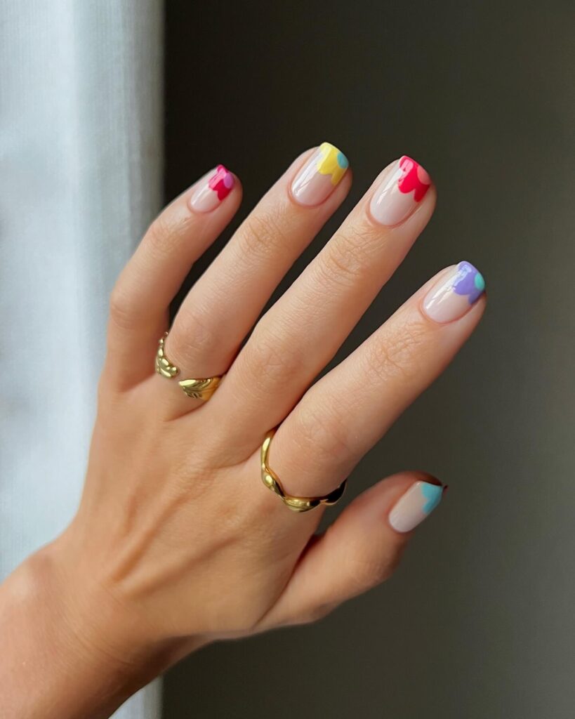 A collection of flower nails featuring spring nail colors, summer flower nails, hand-painted floral nail designs, and elegant pastel nail art.