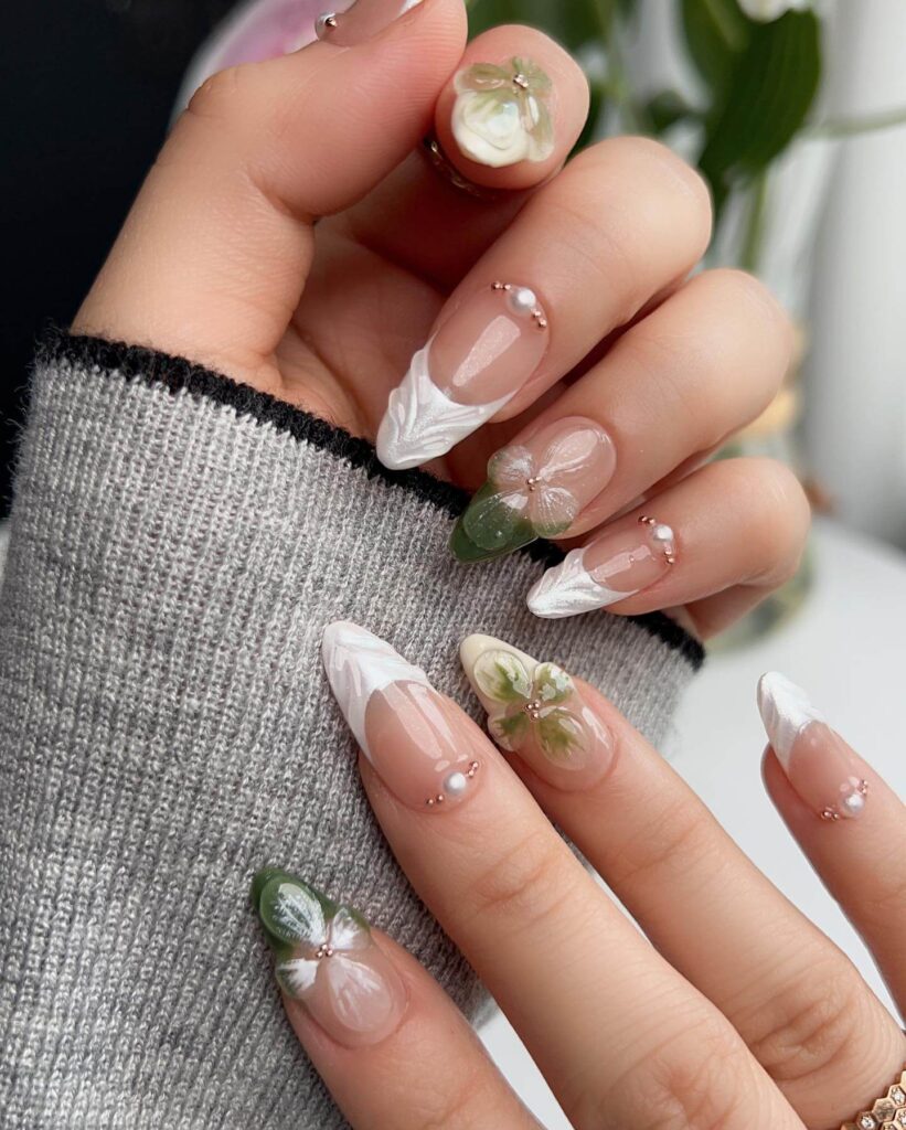 A collection of flower nails featuring spring nail colors, summer flower nails, hand-painted floral nail designs, and elegant pastel nail art.