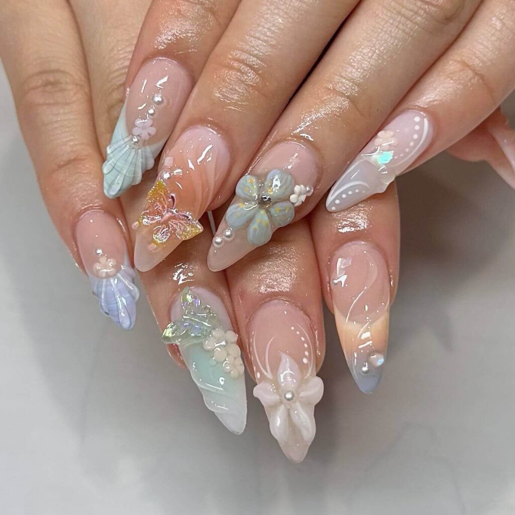 A collection of flower nails featuring spring nail colors, summer flower nails, hand-painted floral nail designs, and elegant pastel nail art.