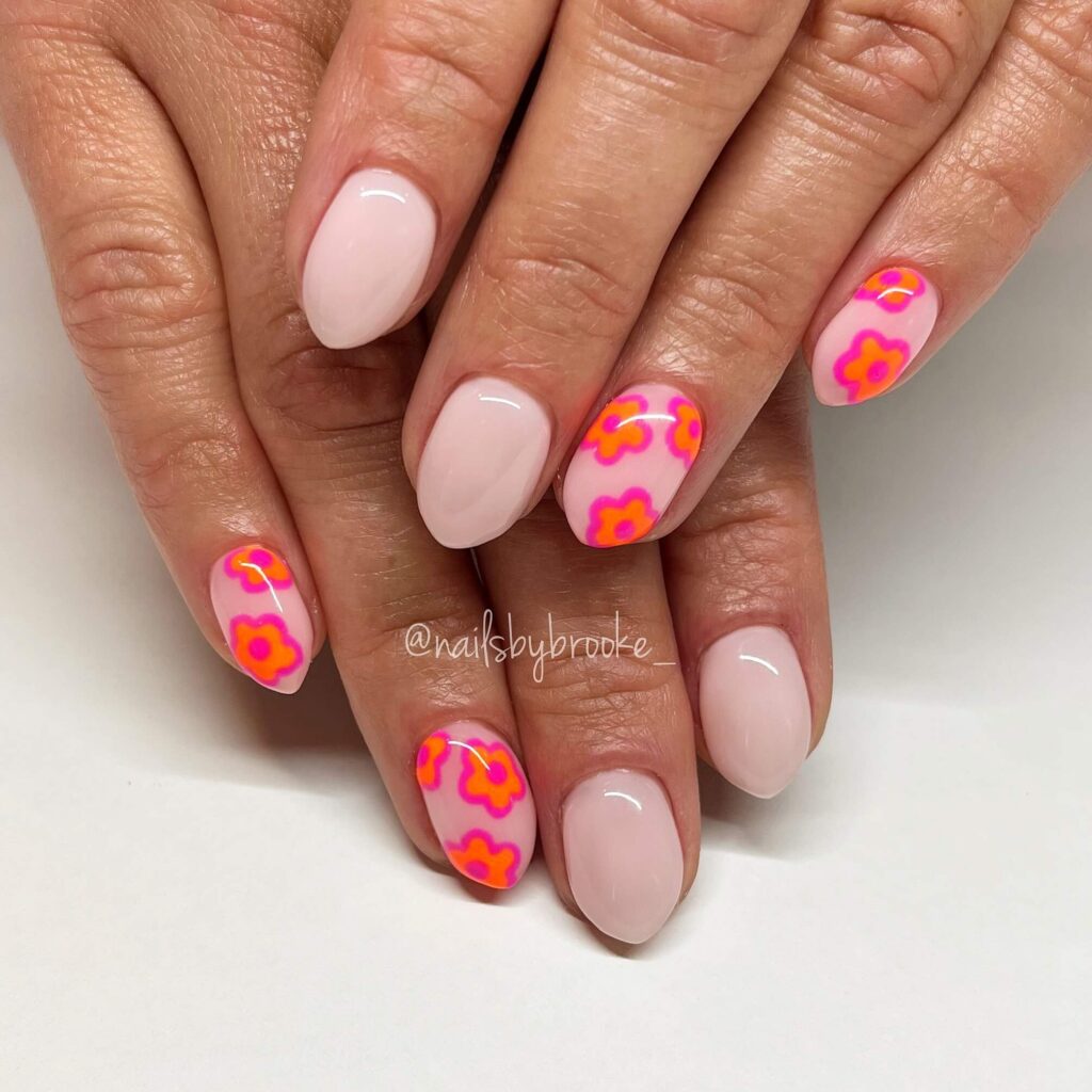 A collection of flower nails featuring spring nail colors, summer flower nails, hand-painted floral nail designs, and elegant pastel nail art.