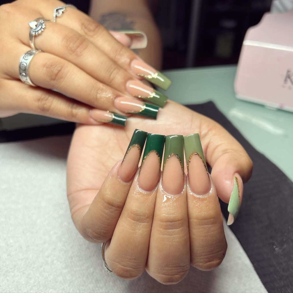 A stunning collection of green nail designs, featuring neon green nails, dark green stiletto nails, and mint green manicures.