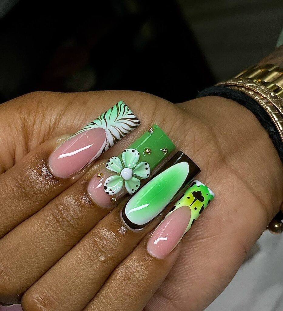 A stunning collection of green nail designs, featuring neon green nails, dark green stiletto nails, and mint green manicures.