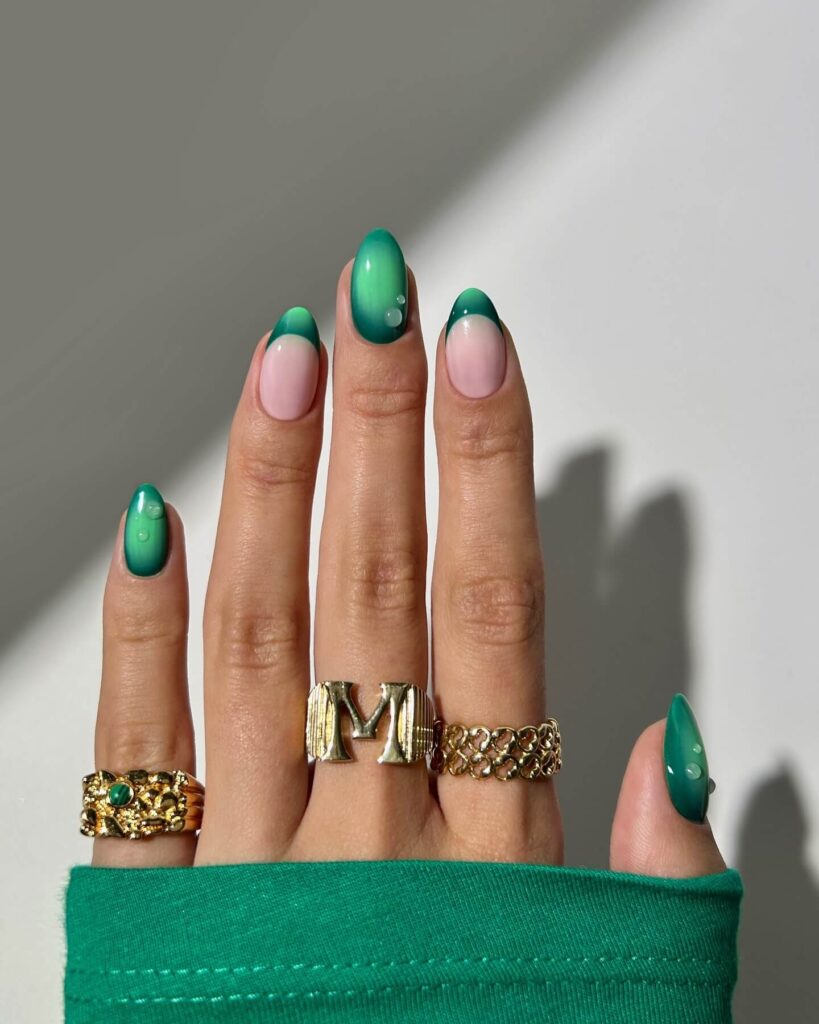 A stunning collection of green nail designs, featuring neon green nails, dark green stiletto nails, and mint green manicures.