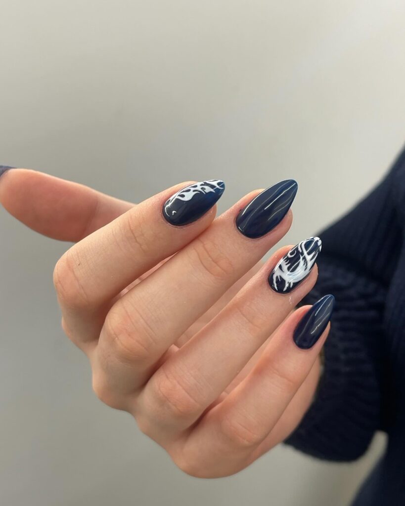 A collection of oval nails featuring glossy, matte, and minimalist designs, perfect for a chic and sophisticated manicure.