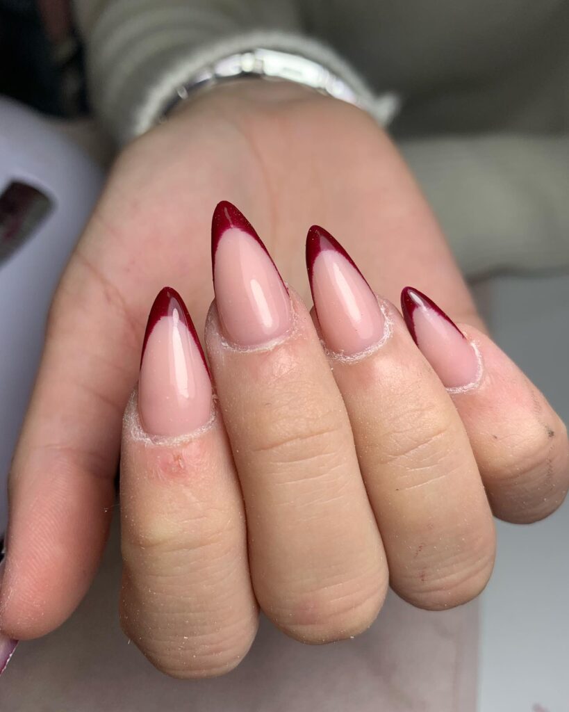 A collection of oval nails featuring glossy, matte, and minimalist designs, perfect for a chic and sophisticated manicure.