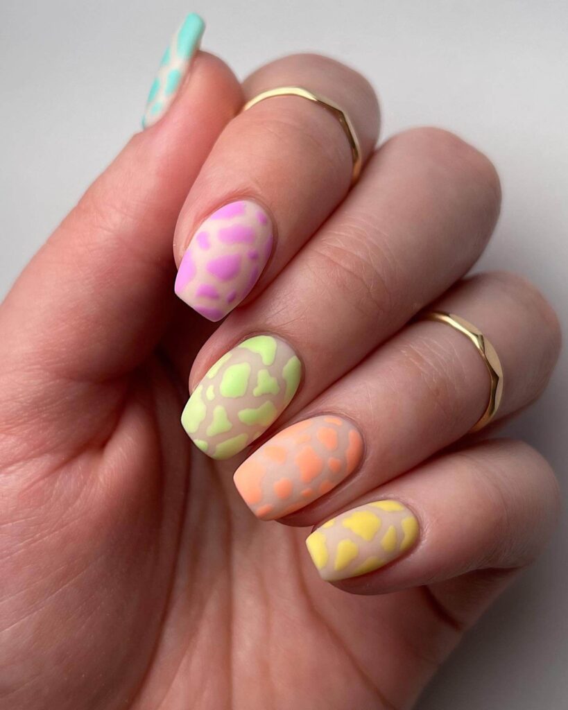 A stunning array of pastel nails with marble nail art and colorful pastel nail polish designs.
