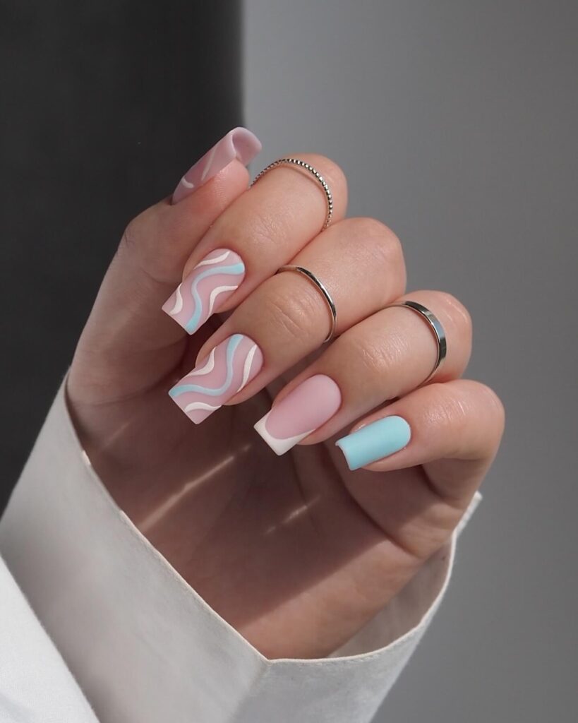 A stunning array of pastel nails with marble nail art and colorful pastel nail polish designs.
