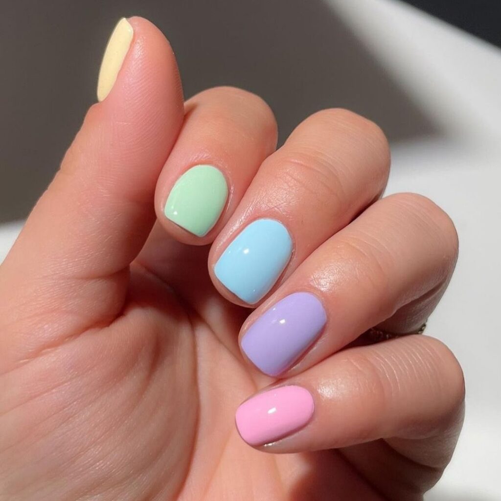 A stunning array of pastel nails with marble nail art and colorful pastel nail polish designs.
