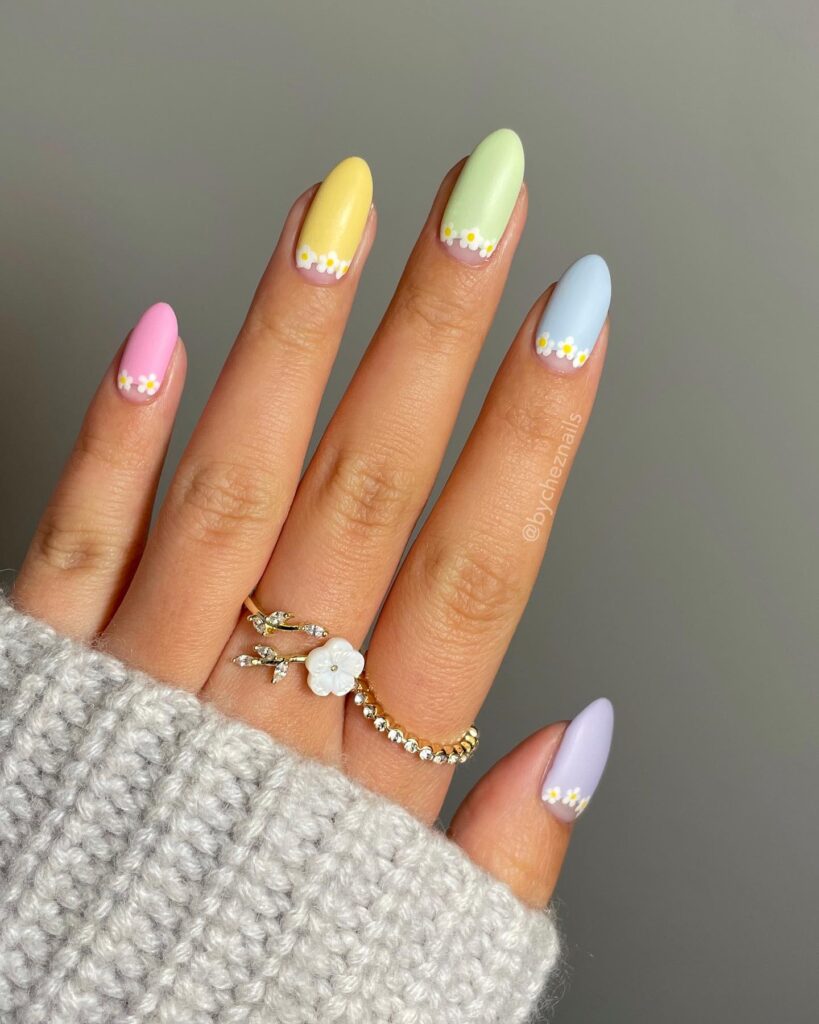 A stunning array of pastel nails with marble nail art and colorful pastel nail polish designs.
