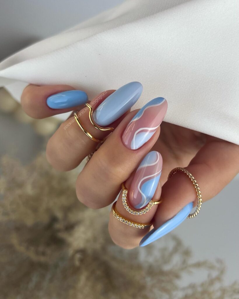 A stunning array of pastel nails with marble nail art and colorful pastel nail polish designs.
