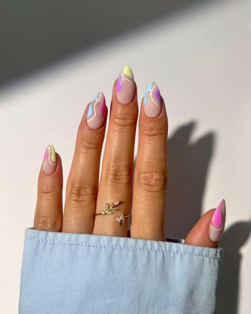 A stunning array of pastel nails with marble nail art and colorful pastel nail polish designs.
