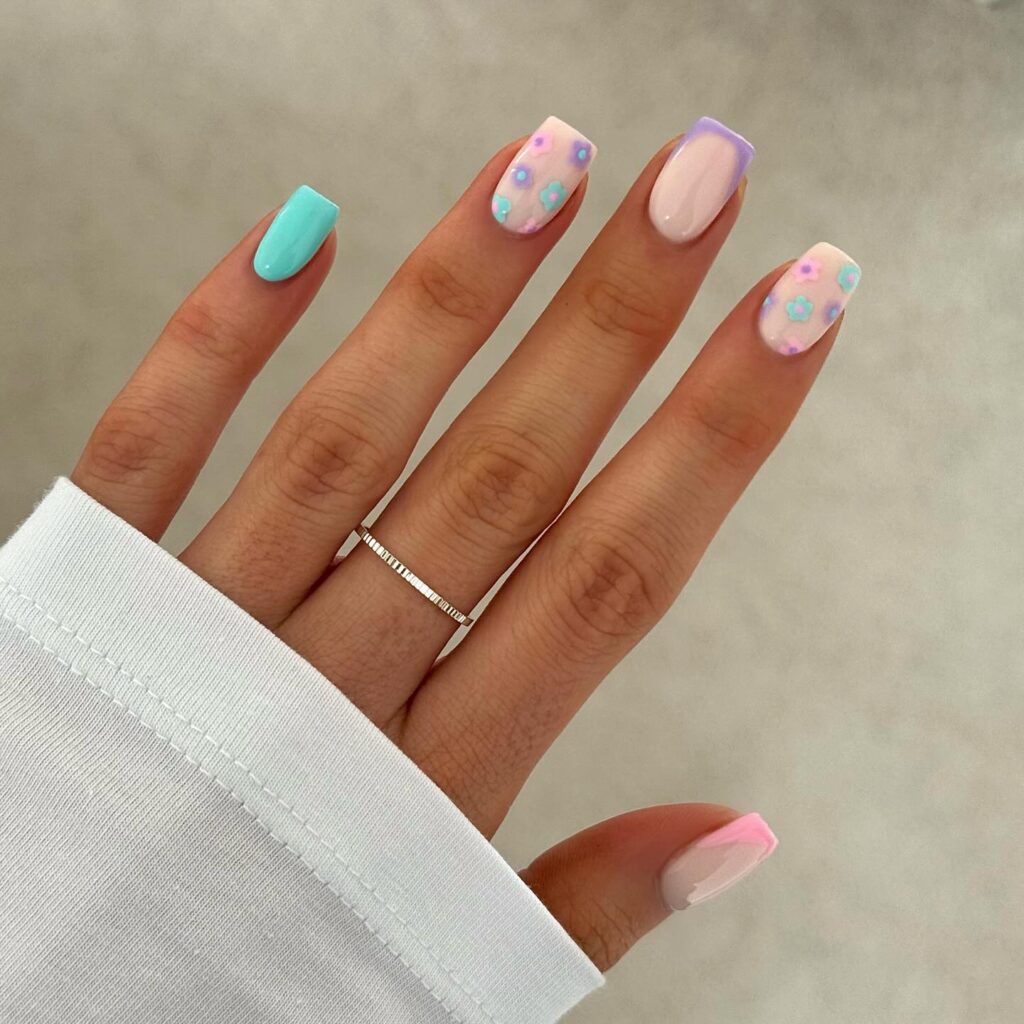 A stunning array of pastel nails with marble nail art and colorful pastel nail polish designs.
