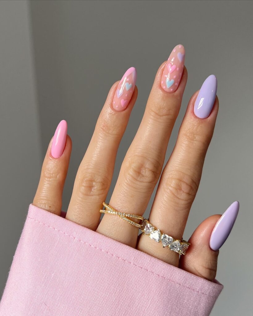 A stunning array of pastel nails with marble nail art and colorful pastel nail polish designs.
