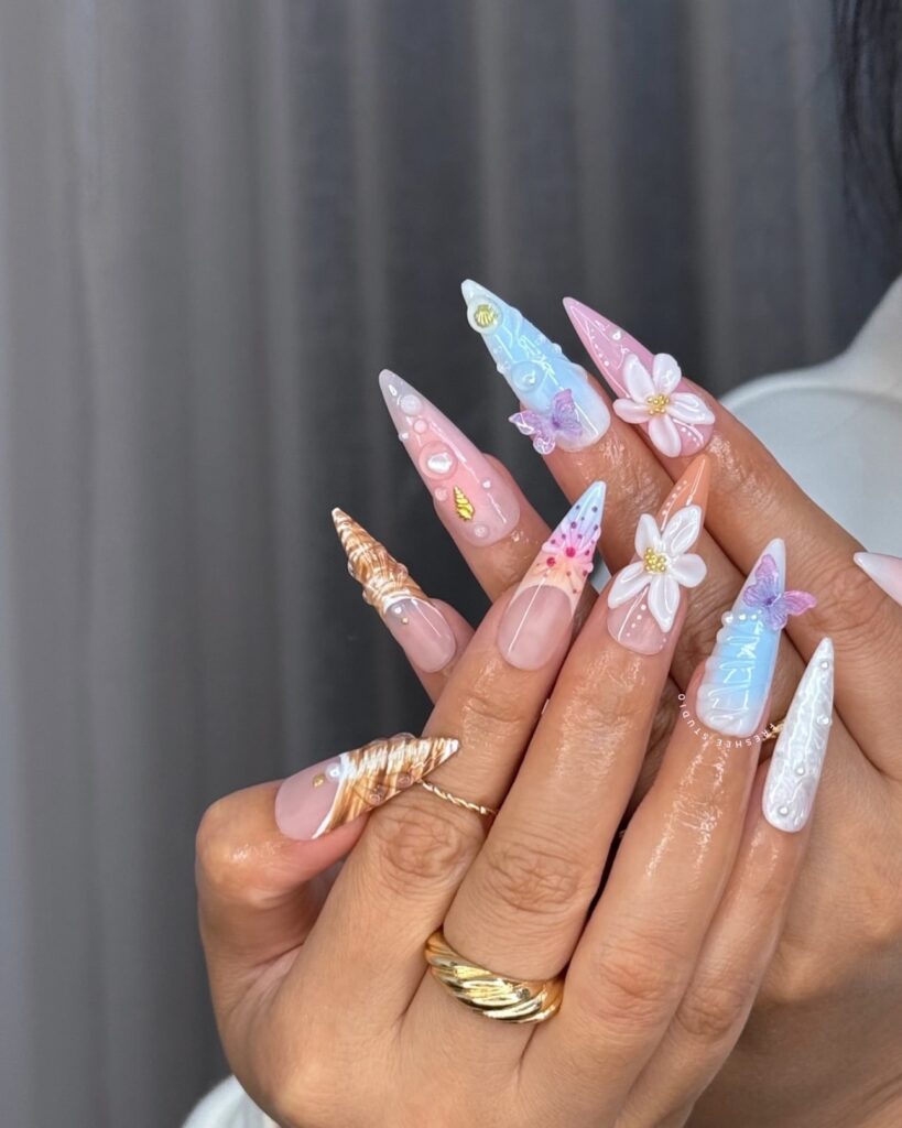 A stunning array of pastel nails with marble nail art and colorful pastel nail polish designs.
