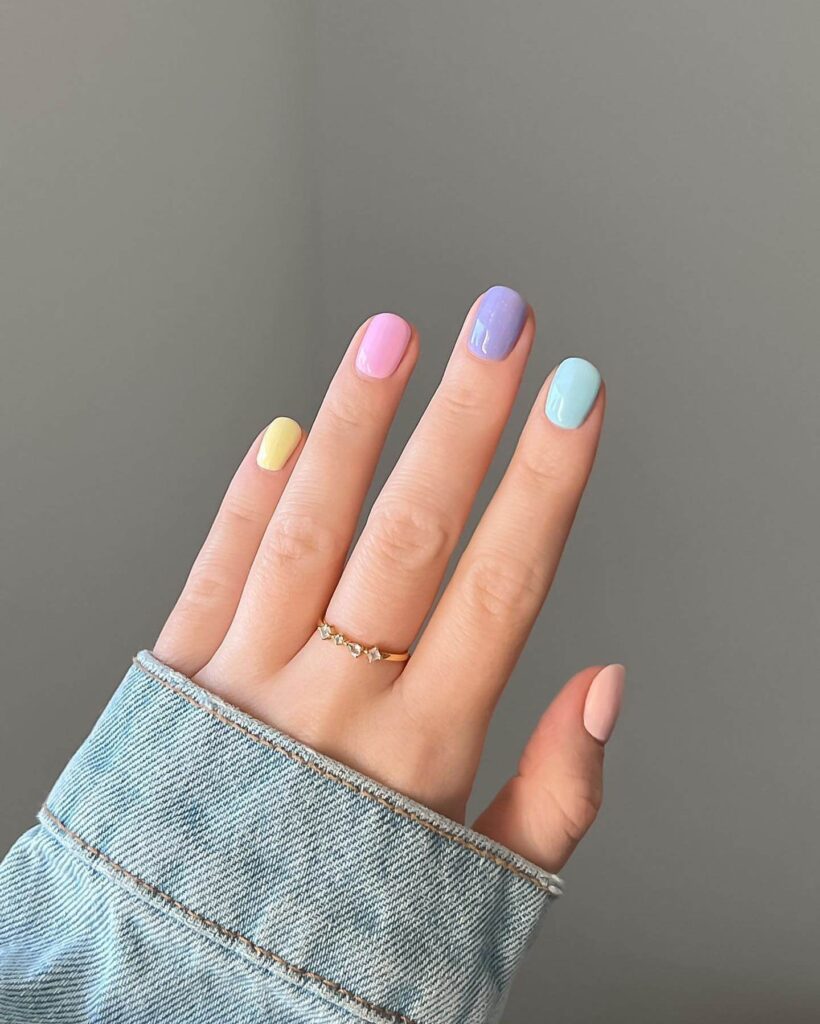 A stunning array of pastel nails with marble nail art and colorful pastel nail polish designs.
