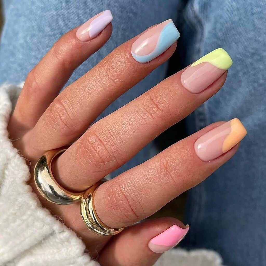 A stunning array of pastel nails with marble nail art and colorful pastel nail polish designs.
