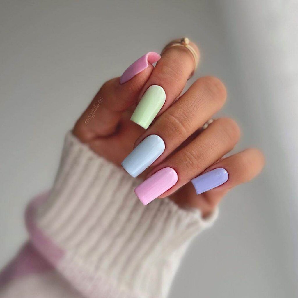 A stunning array of pastel nails with marble nail art and colorful pastel nail polish designs.
