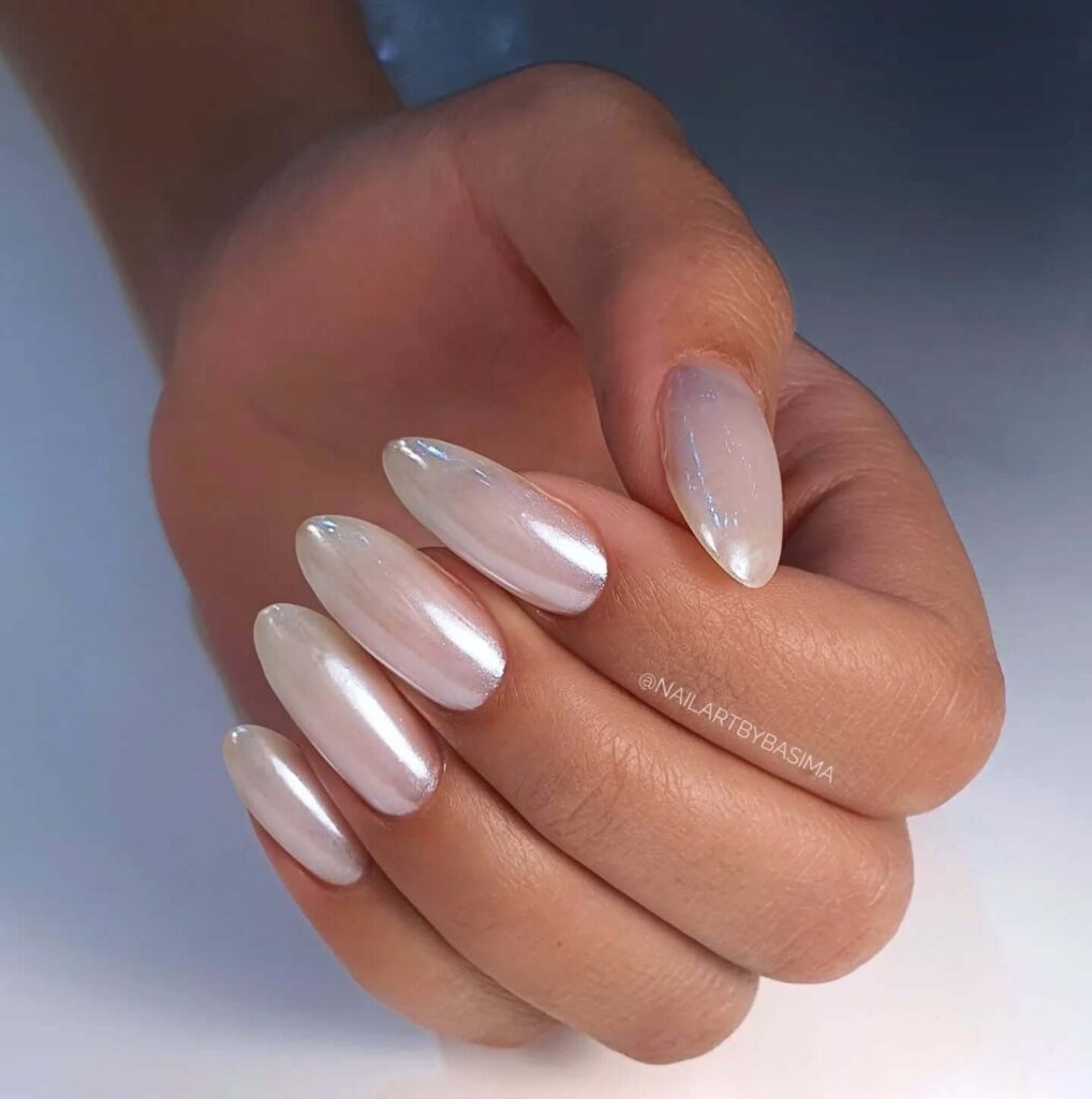 Elegant pearl nails featuring natural to acrylic designs, explore pearl nails for weddings, proms, and formal occasions.