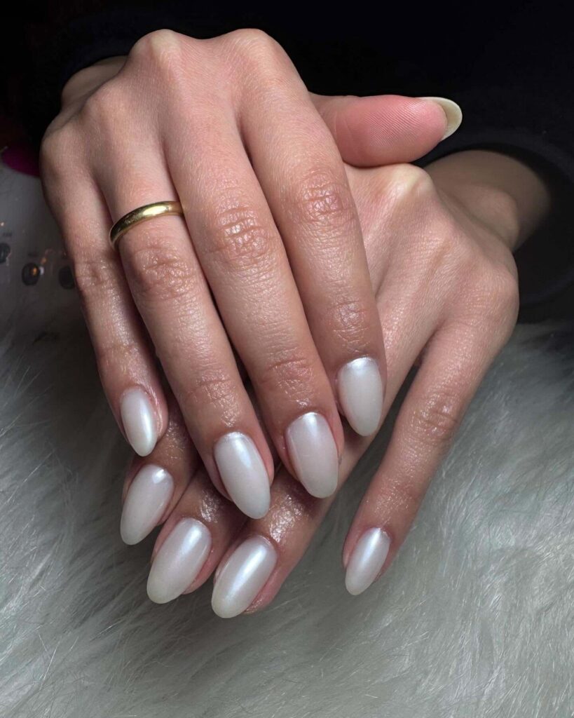 Elegant pearl nails featuring natural to acrylic designs, explore pearl nails for weddings, proms, and formal occasions.