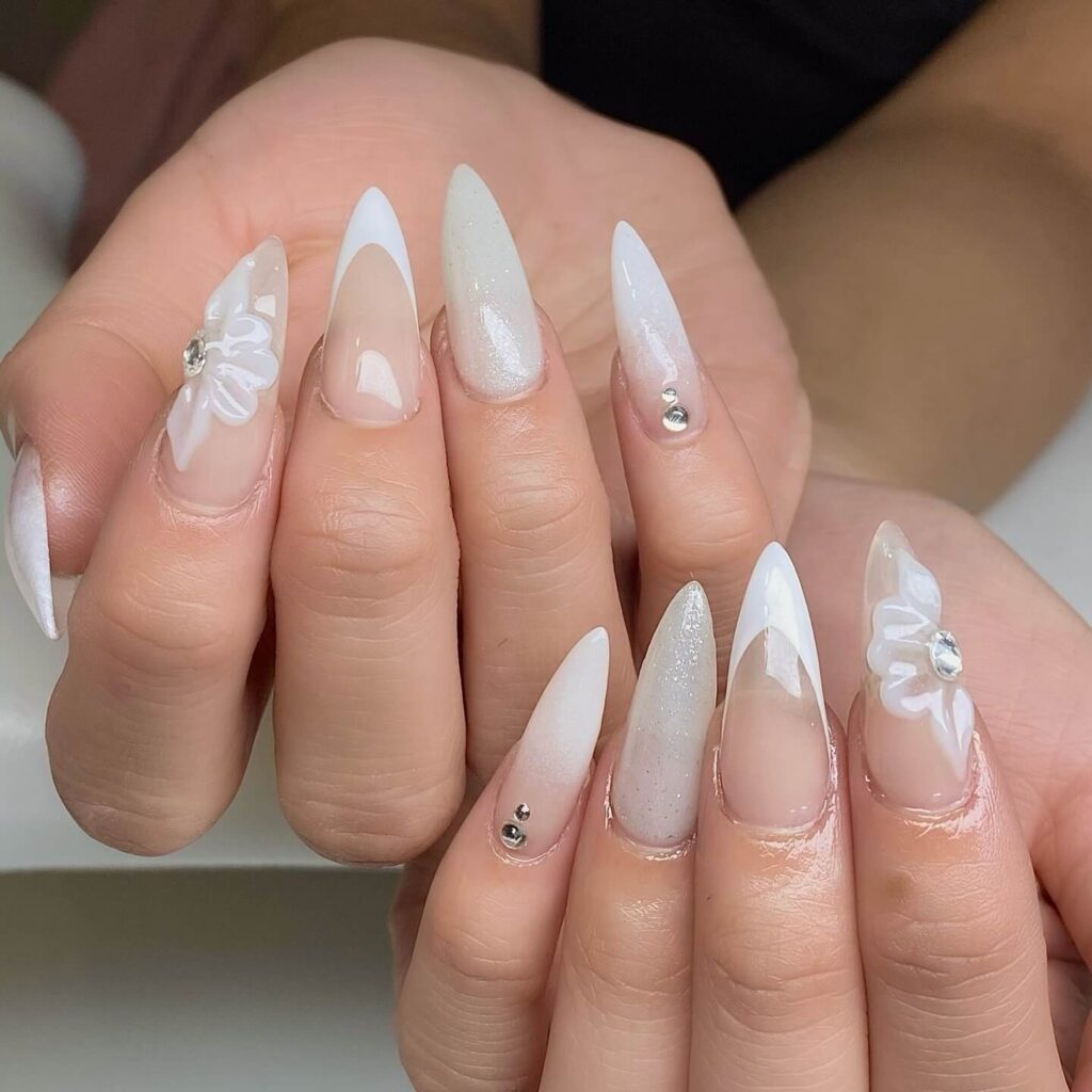 Elegant pearl nails featuring natural to acrylic designs, explore pearl nails for weddings, proms, and formal occasions.