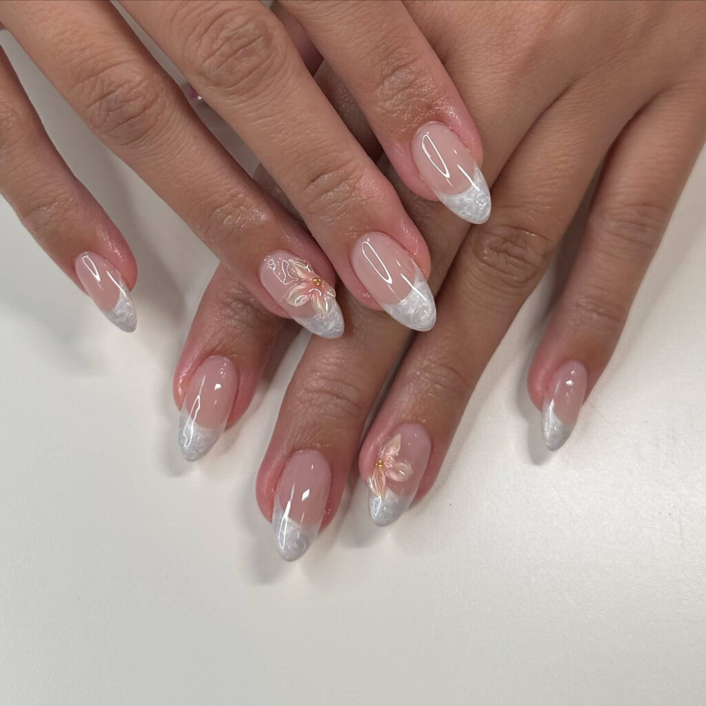 Elegant pearl nails featuring natural to acrylic designs, explore pearl nails for weddings, proms, and formal occasions.