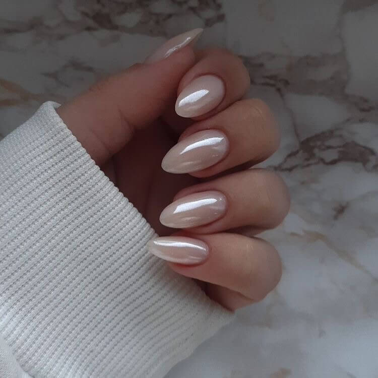 Elegant pearl nails featuring natural to acrylic designs, explore pearl nails for weddings, proms, and formal occasions.