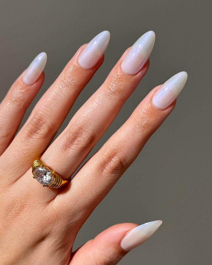 Elegant pearl nails featuring natural to acrylic designs, explore pearl nails for weddings, proms, and formal occasions.