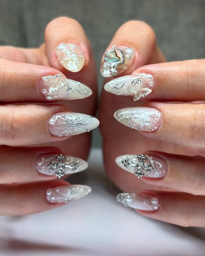 Elegant pearl nails featuring natural to acrylic designs, explore pearl nails for weddings, proms, and formal occasions.