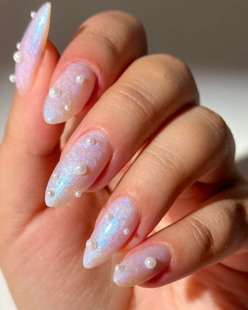 Elegant pearl nails featuring natural to acrylic designs, explore pearl nails for weddings, proms, and formal occasions.