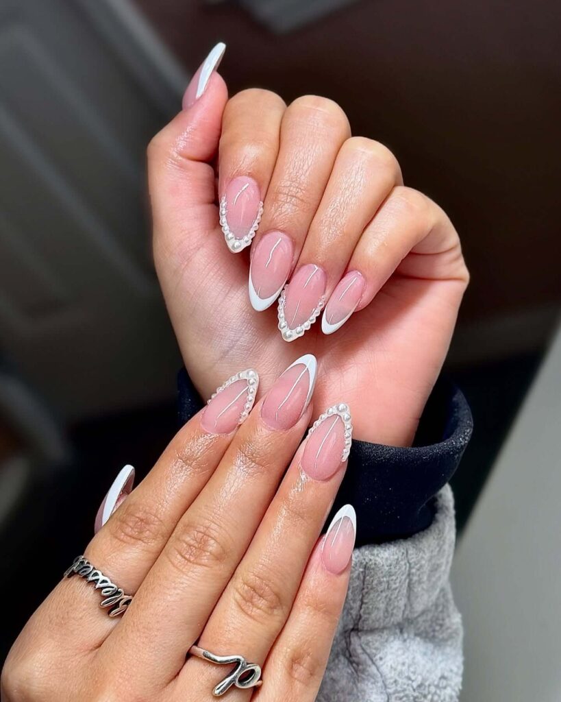 Elegant pearl nails featuring natural to acrylic designs, explore pearl nails for weddings, proms, and formal occasions.