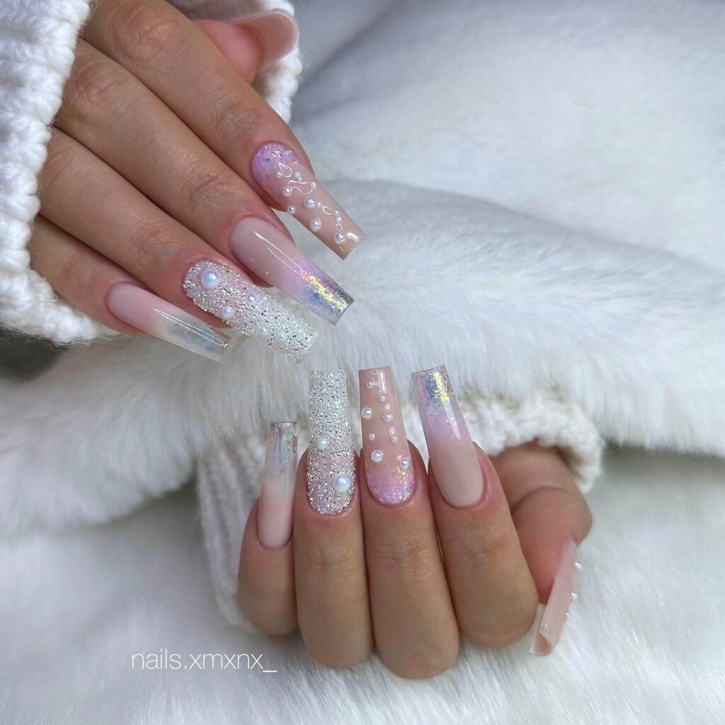 Elegant pearl nails featuring natural to acrylic designs, explore pearl nails for weddings, proms, and formal occasions.