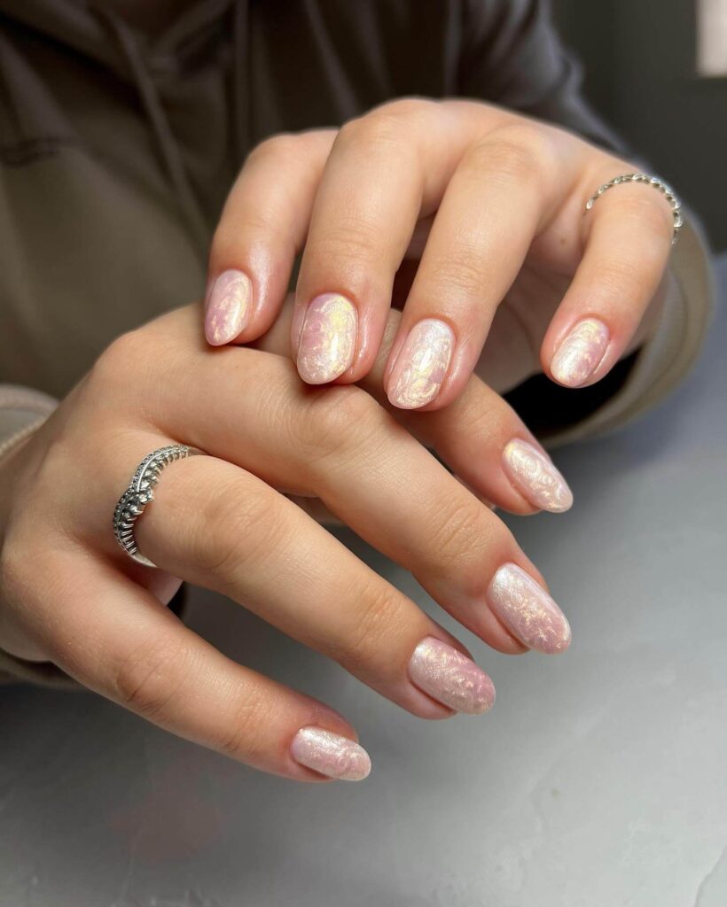 Elegant pearl nails featuring natural to acrylic designs, explore pearl nails for weddings, proms, and formal occasions.