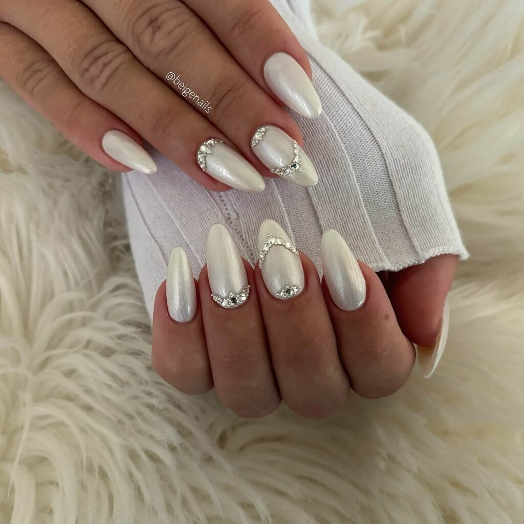 Elegant pearl nails featuring natural to acrylic designs, explore pearl nails for weddings, proms, and formal occasions.